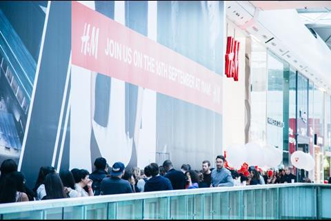 Shoppers queue patiently